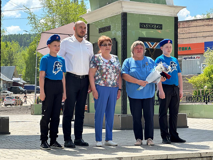 В Нижнеилимском районе открылась фотовыставка "Аллея Памяти участников СВО"